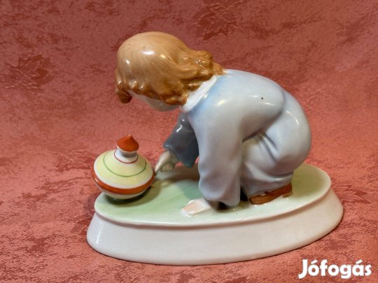 Zsolnay porcelán figura, dísztárgy, nipp, Búgócsigás gyerek