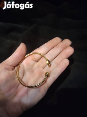 aranyozott karperec és gyűrű 