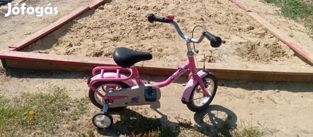 eladó 12" Puky márkájú kislány bicikli. 