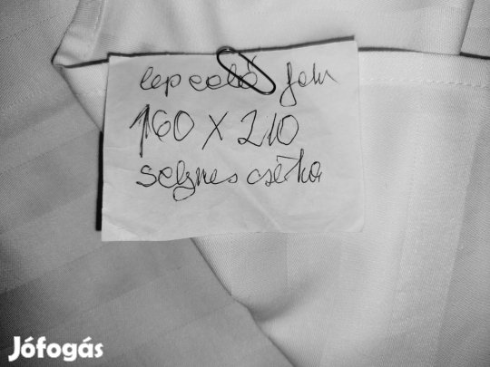 fehér selymes tapintasu lepedő