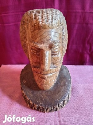 kézzel faragott férfi fej szobor 