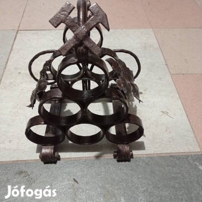 kovácsoltvas bortartó.