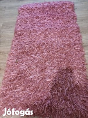 rózsaszínű szőnyeg