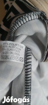 új görög mintás fekete bézs zsebes cibzáros pulóver 