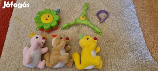 zenélő forgó babajáték